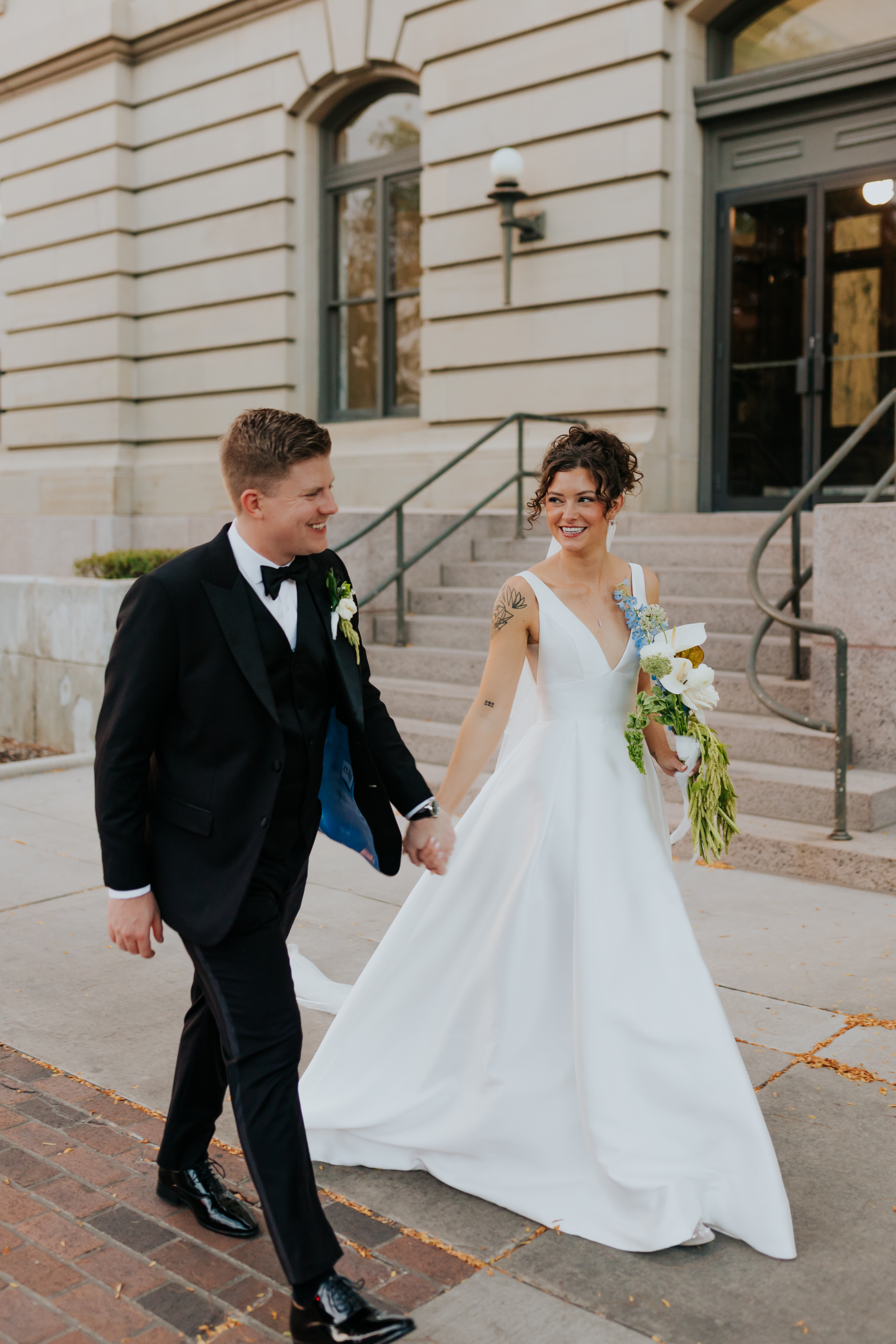 Groom and bride walking after ceremony